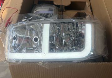 01-06 GMC Yukon Denali Chrome Clear Switchback LED Strip Headlights Parking Lights