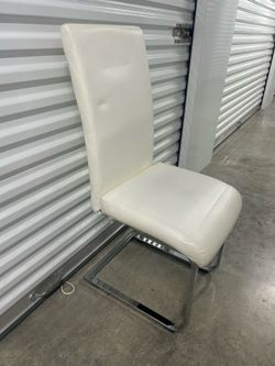 Set of 8 white dining chairs