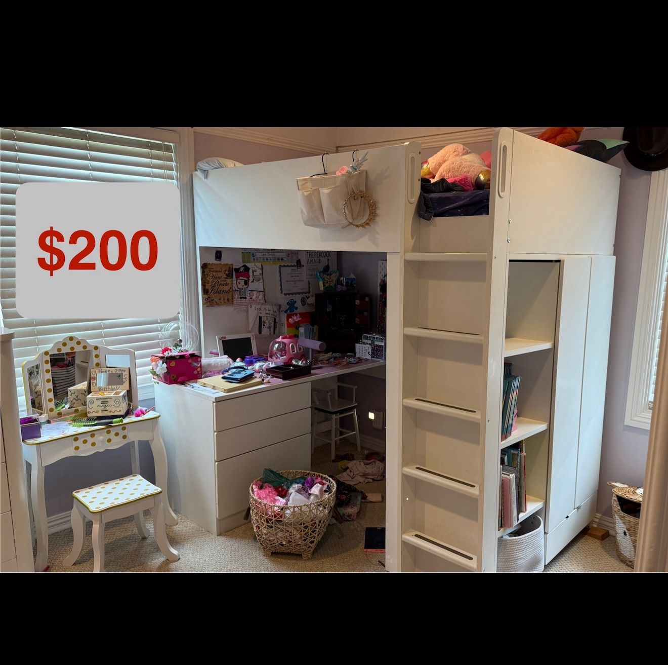 IKEA loft bed with desk, dresser, and shelves