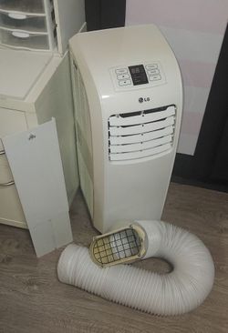 LG Portable Air Conditioner 8,000 BTU  Includes Window Kit Pre-owned