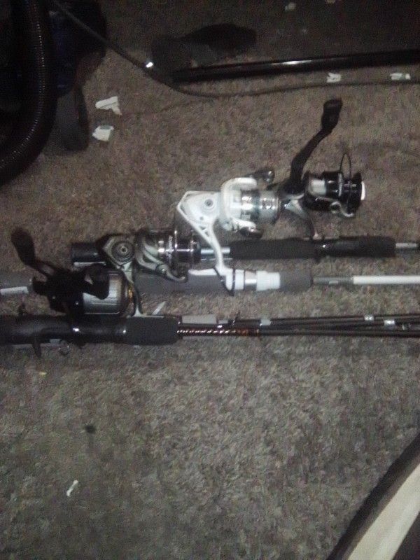 Four Brand New Fishing Poles With Rods And Reels And String