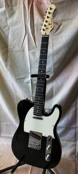 Brand new Donner telecaster electric guitar with new bag and cable
