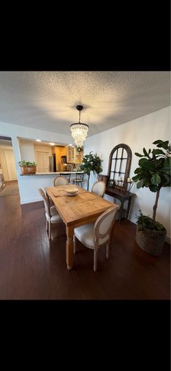 Table with four nice chairs and a credenza desk