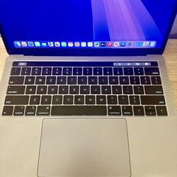 MacBook Pro  (2019) – Touch Bar- Great for a friend 🎄