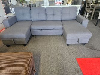 Gray Sectional Sofa with Pull-Out Sleeper and Storage