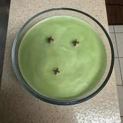 Mint Green Wood Wick Candle In A Clear Container With A Eucalyptus Fragrance