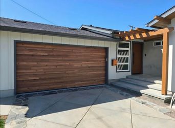 Woodlike Cedar plank roll-up Garage door