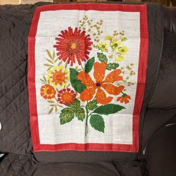 Vintage 1970’s  linen tea towel  19x27  florals in vibrant reds oranges yellows green 