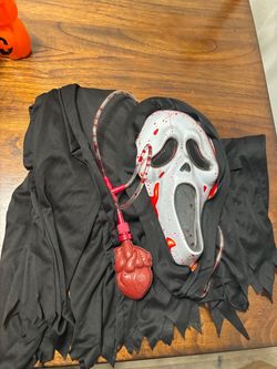Ghost face costume $12