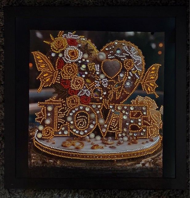Gold and Brown Love Decor with Intricate Accents