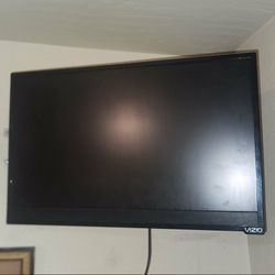 LIKE NEW 24" VIZIO LED SMART TV MODEL NO. E241i-B1 120V 60Hz TELEVISION SET WITH WIRES AND REMOTE 