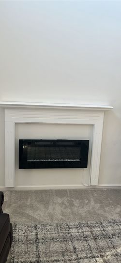 Electric fire place and mantle/surrounding place