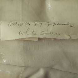 Sheer Curtains And A Panel 