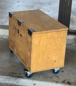 Wooden box with wheels