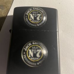 Jack Daniels, new fliptop lighter fluid, not included