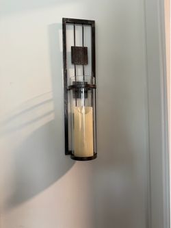 Candle and wall candle holder