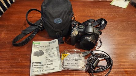 Canon Power Shot S5IS Camera, Bag, Cords, 2 Books, 1 Memory Card, New Batteries