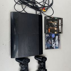 Play Station 3 With Four Games & All Cords With It