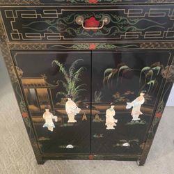Black Lacquer cabinet with Pearl Inlays. 36" High 24" Wide