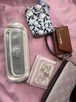 Wallets and wrist wallets