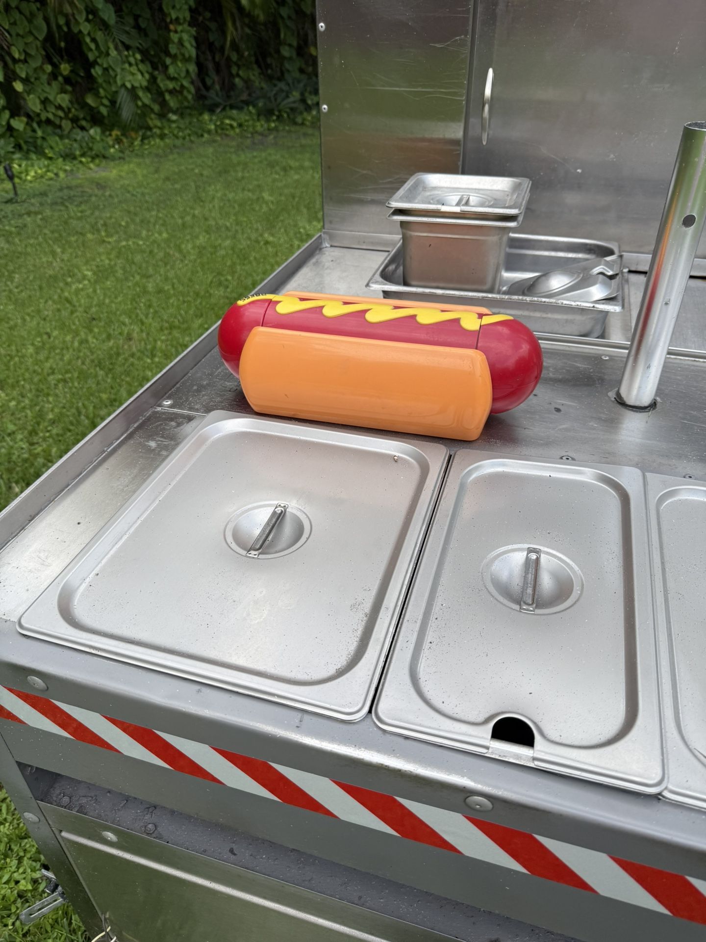 One used hotdog cart