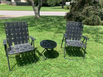 Small glass table and two chairs.