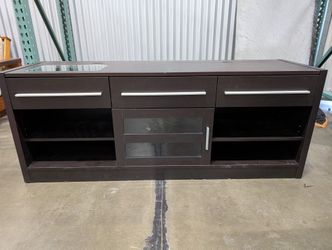 Modern Dark Brown Media Console with Glass Accent and Storage