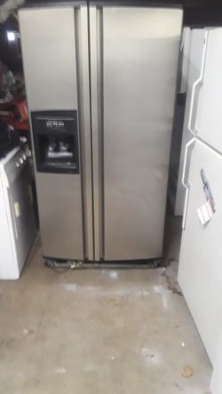 Stainless steel refrigerator side by side Frigidaire