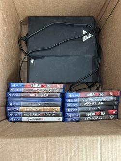 PlayStation 4 with multiple games