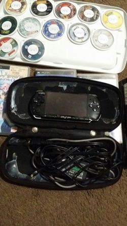 Psp with 3 movies and over 6 games