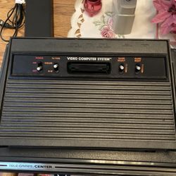 Atari 2600 Mint Condition 4 Controllers And Booklets & 11 Games 