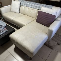 Italian leather, beige, small sectional sofa, and four black barstools