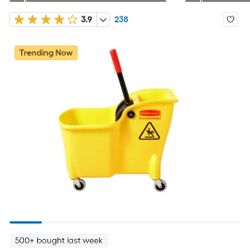 RUBBERMAID COMMERCIAL MOP BUCKET, MOP, AND WET FLOOR SIGN. SELLING AS A SET. CITY OF ORANGE. 