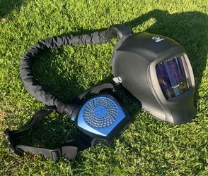 Miller welding helmet w/ Digital Infinity ClearLight lens and Miller Coolbelt cooling system
