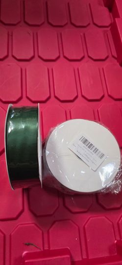 Satin green ribbon rolls