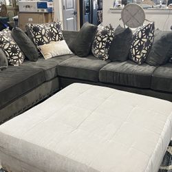 Gray Sectional, Ottoman, &  a Chair 1/2