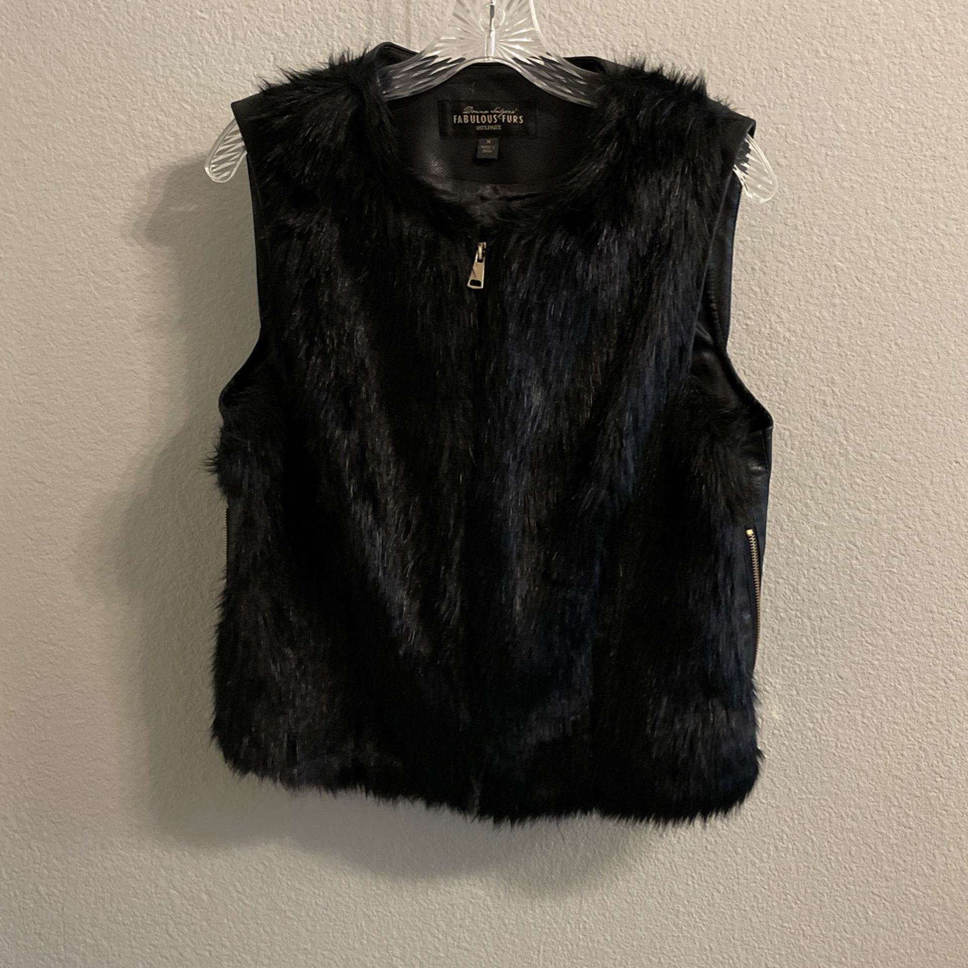 “fabulous furs” faux fur and leather vest