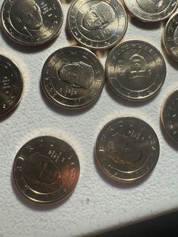 New 2026 President Trump Semiquincentennial $1 Coin in hand