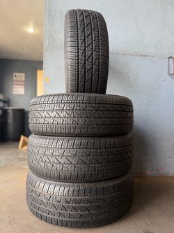 235/55/19 Firestone