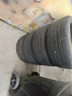 3 good BRIDGESTONE TURANZA ELbGrand Touring All-Season Tires  in 235/40R19