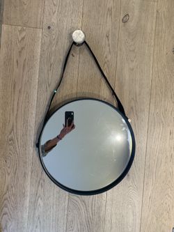 Round steel mirror with leather strap