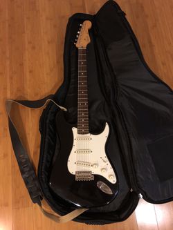 '93-'94 Japanese made Fender Squier Stratocaster, with gig bag
