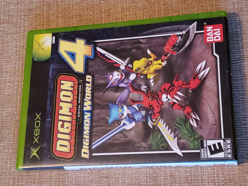 DIGIMON WORLD 4 - XBOX Game includes the instruction manual