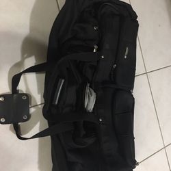 Large Delsey Rolling Duffle -travel suitcase