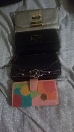 They are purses they are name brand for wallets for women one is coach and two are Wilson's Leather and the pink one fossil