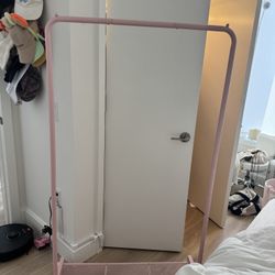 Pink Clothing Rack With Wheel