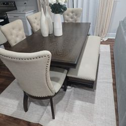 Table, Chairs, Area Rug , Bench