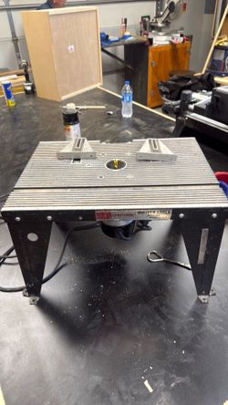2 Sabre saws and Router table with router.  I believe it’s a 3/4 hp router with 1/4 shank.