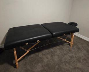 Massage table