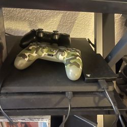 ps4 with 3 remotes 2 headsets and 9 games
